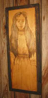 Woodburning, carving and staining